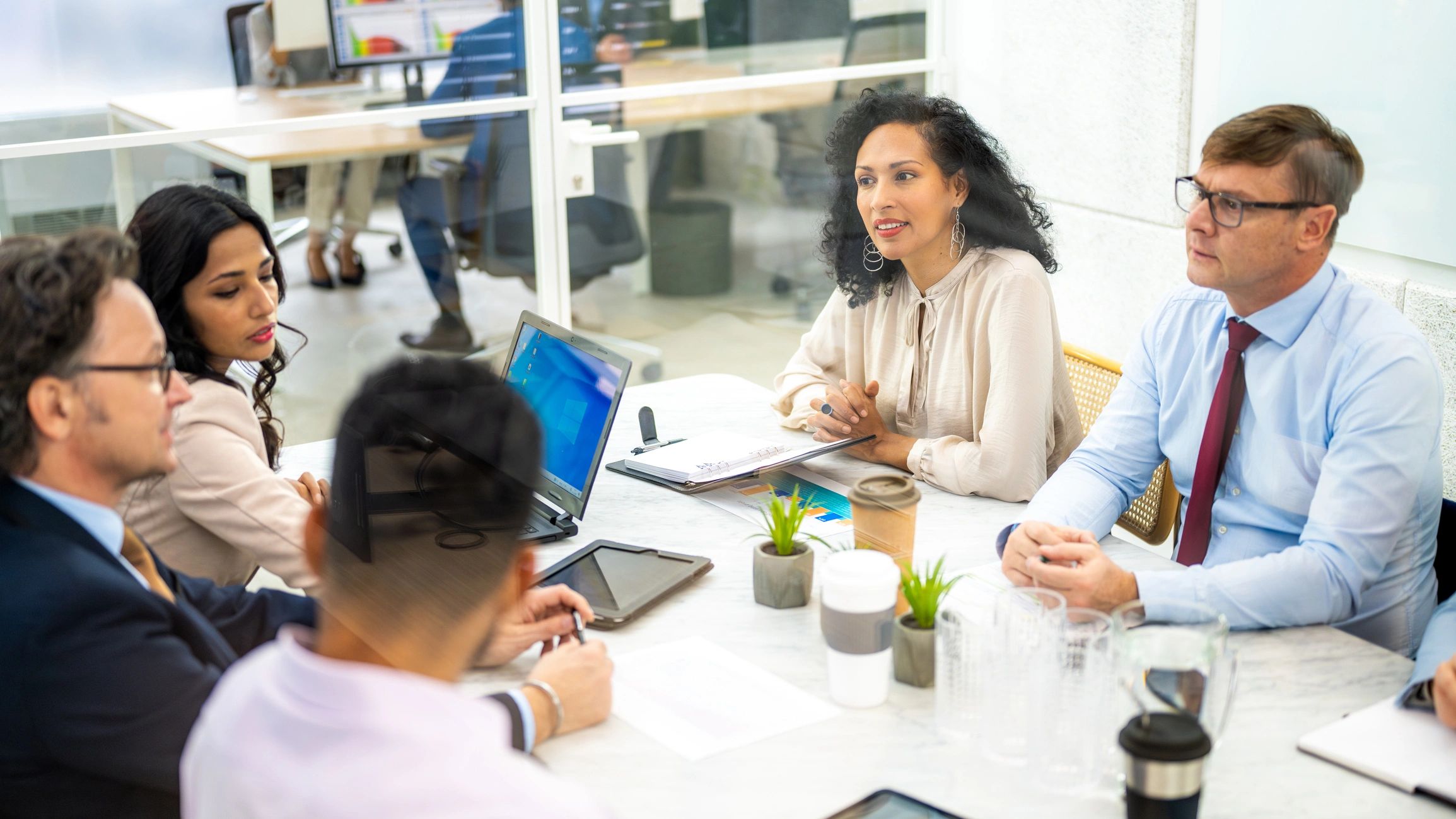 Business owners discussing strategy at a table